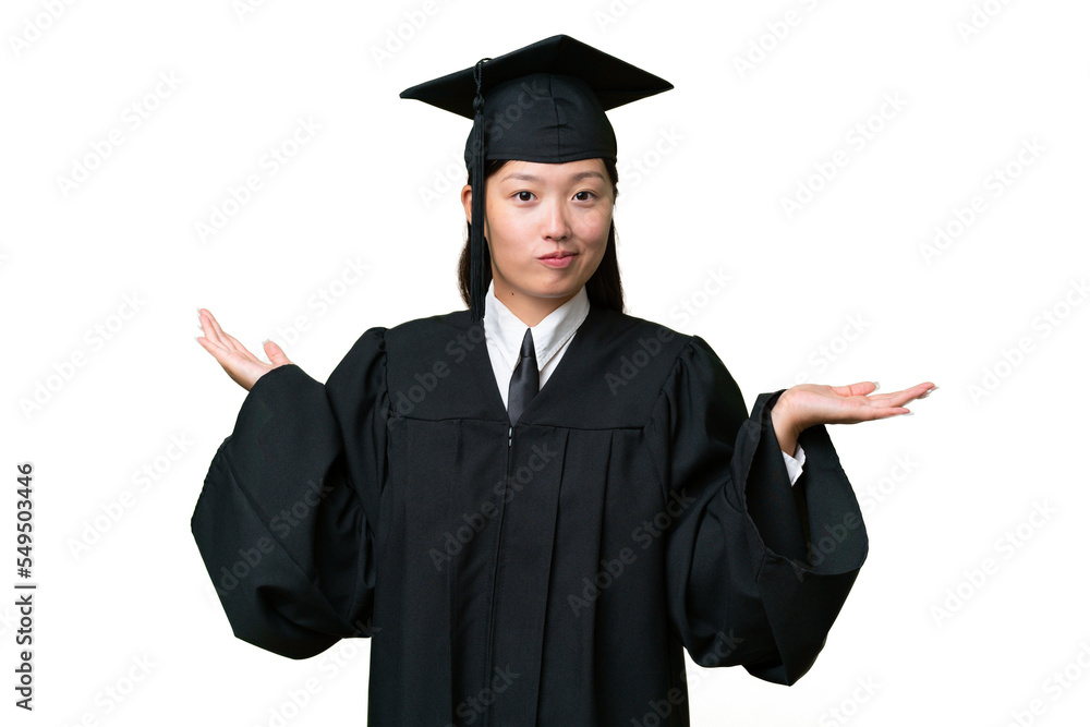 Young university graduate Asian woman over isolated background having doubts while raising hands Young university graduate Asian woman over isolated background having doubts while raising hands
