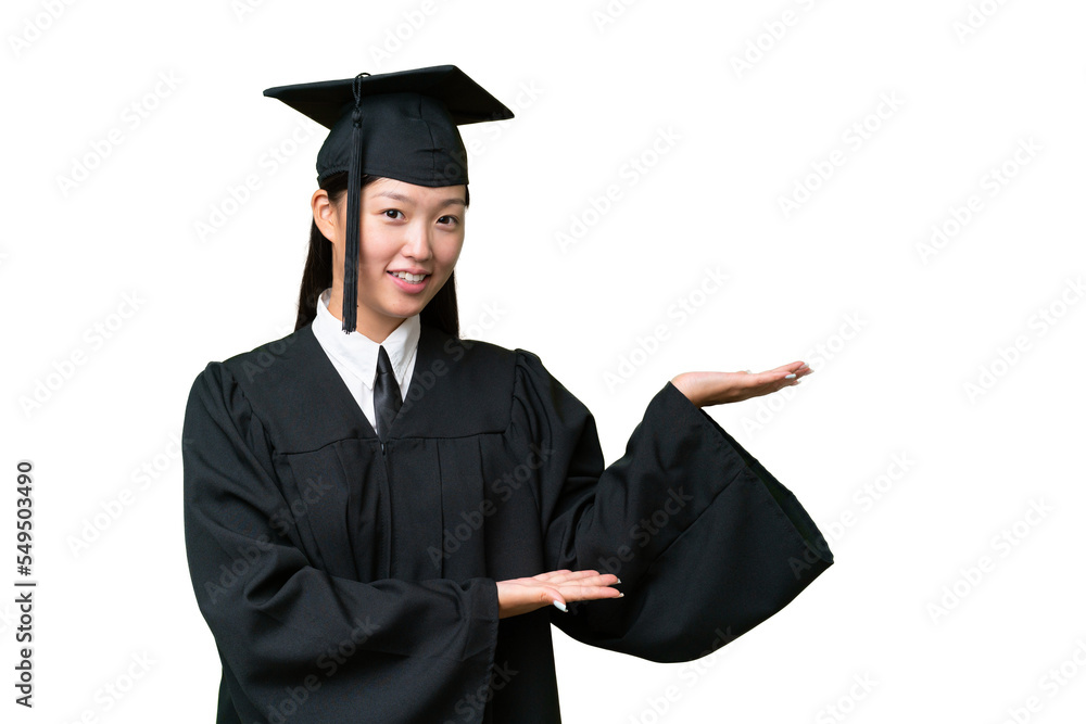 Young university graduate Asian woman over isolated background extending hands to the side for inviting to come Young university graduate Asian woman over isolated background extending hands to the side for inviting to come