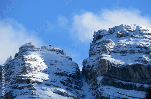 The first early autumn snow on the high alpine peaks above the Calfeisental alpine valley and in the UNESCO World Heritage Tectonic Arena Sardona (UNESCO-Welterbe Tektonikarena Sardona) - Switzerland photo