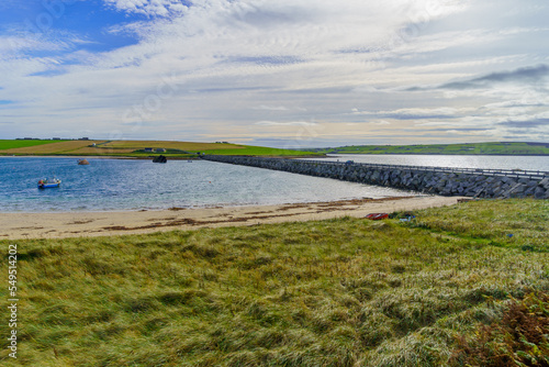 Causeway and shipwrecks, in the Orkney Islands