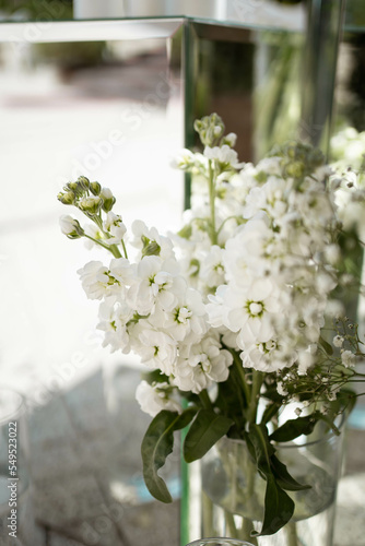 Close up of wedding decorations, with white fresh flowers. Tender wedding arrangements.