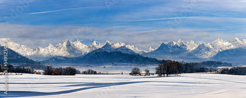 panoramic landscape at winter with alps mountains
