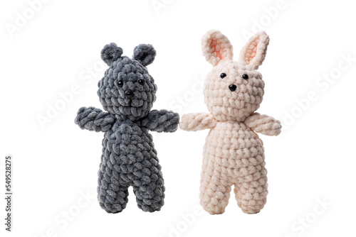 knitted toys with threads isolated on transparent background png . Bear and hare hold hands. Friendship concept