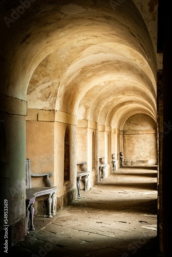 Vertical shot of the curved arches of the Praeneste at Rouseham House photo