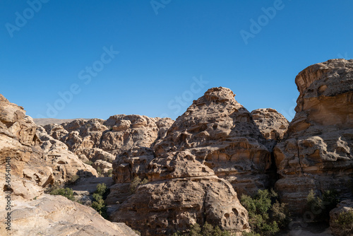 Petra, Jordan, Arabian desert, a dystopian martian landscape with unique rock formations, valleys and dunes. Backdrop for graphic resource or copy space no people