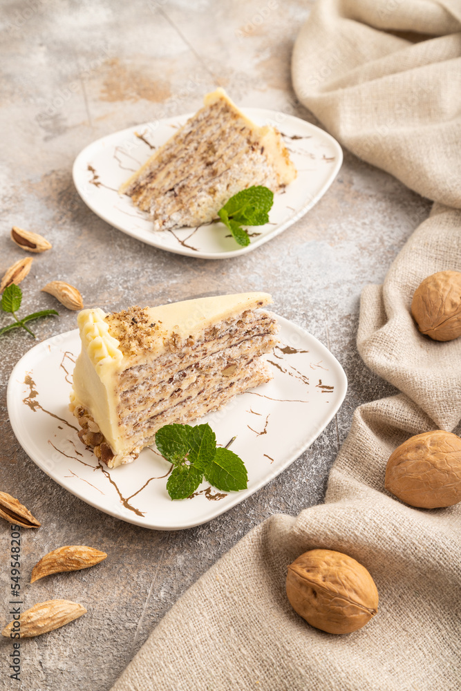 Walnut and almond cake on brown concrete, side view. Walnut and almond cake on brown concrete, side view.