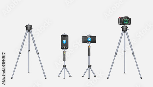 Smartphone and photo camera on tripod. Tools for photography and video content producing in studio