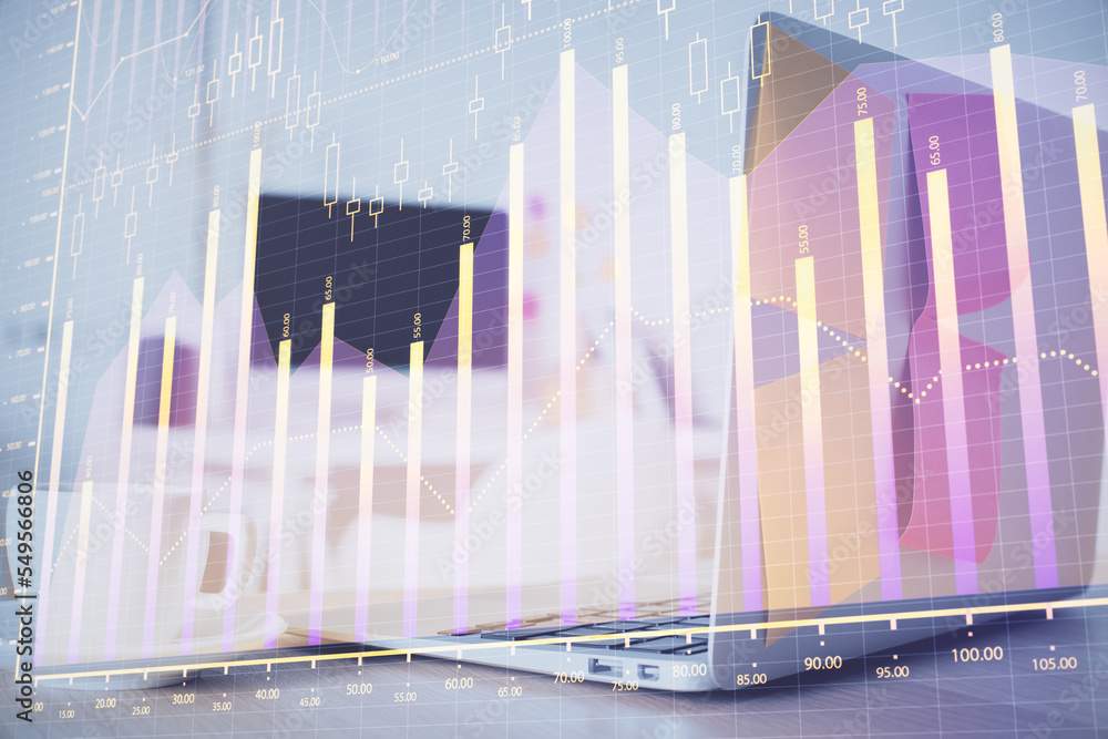 Forex Chart hologram on table with computer background. Multi exposure. Concept of financial markets. Forex Chart hologram on table with computer background. Multi exposure. Concept of financial markets.