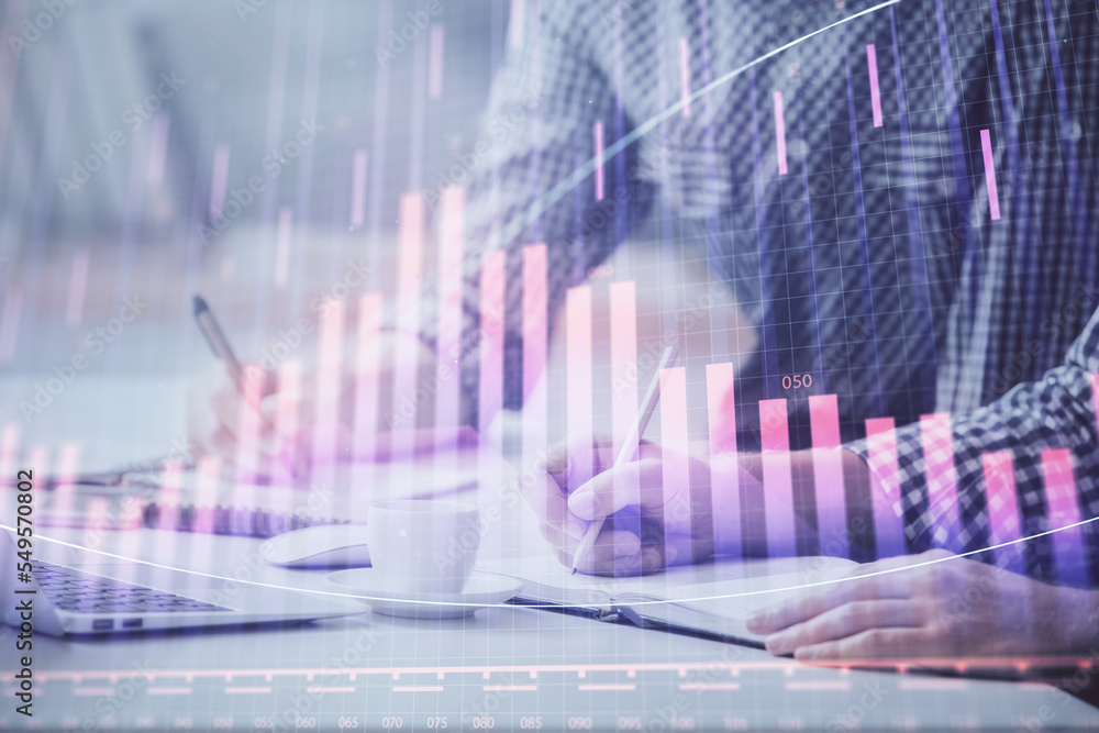 Multi exposure of forex chart with man working on computer on background. Concept of market analysis. Multi exposure of forex chart with man working on computer on background. Concept of market analysis.