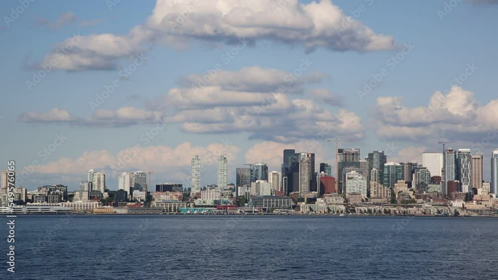 Panoramic view of Seattle cityscape at Elliott Bay in a sunny day, Washington, USA Panoramic view of Seattle cityscape at Elliott Bay in a sunny day, Washington, USA