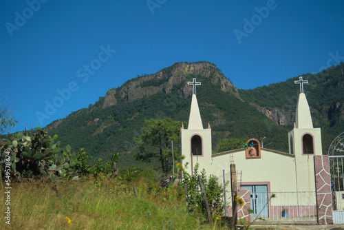 small colonial church in the mountains