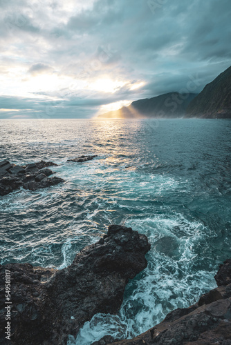 Magnisificat sunrise atmosphere on Seixal beach photographed in the morning. Seixal beach, Madeira Island, Portugal, Europe. photo