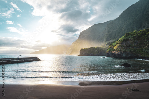 Magnisificat calm sunrise atmosphere on Seixal beach photographed in the morning. Seixal beach, Madeira Island, Portugal, Europe. photo