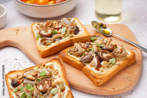 Wooden board of tasty toast...