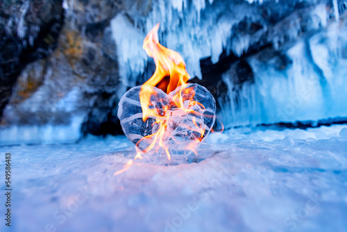 Arctic landscape with burn ice heart glacier frozen snow lake Baikal or Antarctica extreme with sun light photo