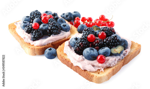 Tasty sandwiches with cream cheese and berries isolated on white