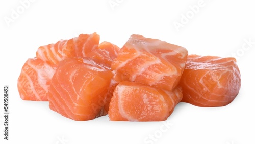 Pieces of fresh raw salmon on white background