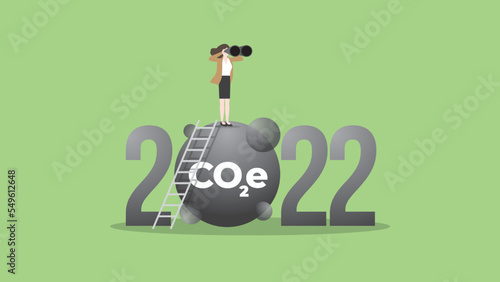 ESG and green business policy concept in the year 2022. A vision businesswoman uses binoculars. Net zero emission, carbon footprint, carbon dioxide equivalent, global greenhouse gas, save the world.