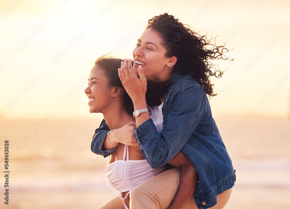 Woman, friends and piggy back on beach for happy sunset travel vacation or summer holiday. Couple, friendship and relax quality time or playful bonding together on ocean sand for love or happiness Woman, friends and piggy back on beach for happy sunset travel vacation or summer holiday. Couple, friendship and relax quality time or playful bonding together on ocean sand for love or happiness