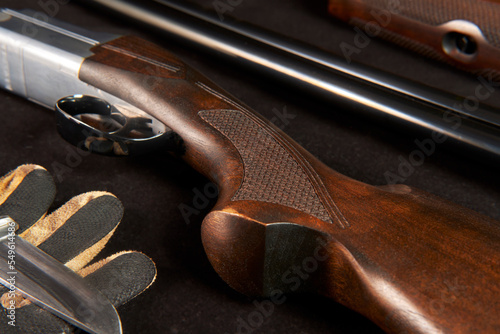 incomplete disassembly of a hunting double-barreled shotgun for cleaning and lubrication