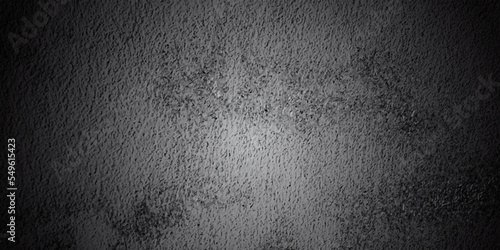 Black and dark gray rough grainy stone and concrete texture background. Wall grunge texture background.