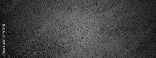 Black and dark gray rough grainy stone and concrete texture background. Wall grunge texture background.