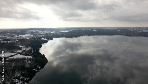 Wallpaper Mural Drone going over lake clouds reflecting on water  Torontodigital.ca