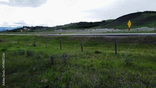 Affordable housing over rural road approached Morley Alberta Canada photo