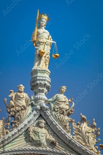 St Mark Basilica, lady justice and catholic statues, facade detail, Venice