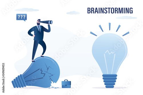 Pitching ideas. Brainstorming concept, smart businessman standing on extinguished bulb and search new good idea. Transformation, change management, transition to better innovative company.