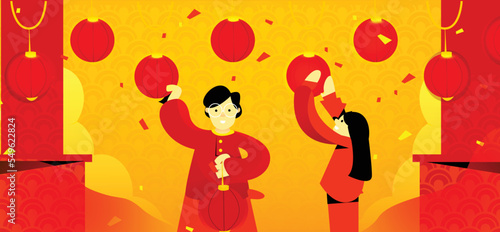 People are decorating the house for Chinese New Year
