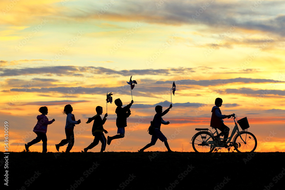 Silhouettes of children running around funny in the morning. Silhouettes of children running around funny in the morning.