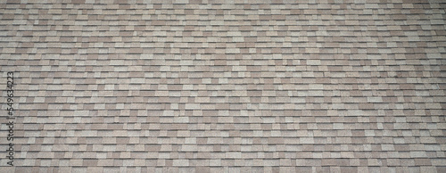 old shingle background on building roof photo