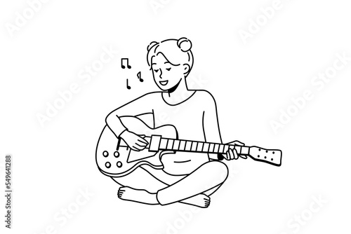 Smiling girl sit on floor playing guitar. Happy female enjoy musical lesson with instrument. Hobby and entertainment. Vector illustration. 