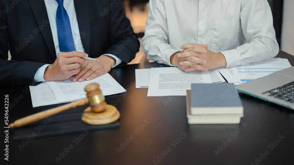 © mojo_cp - Lawyer businessman working with consult. Legal law Judge Gavel Scale of Justice concept..