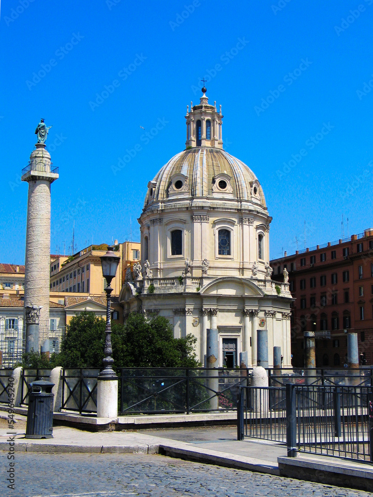 Trajan's column and Chiesa del Santissimo Nome di Maria al Foro Traiano (Church) in Rome, Italy