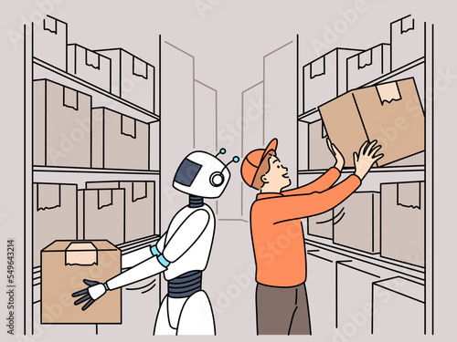 Robot helping male worker in warehouse