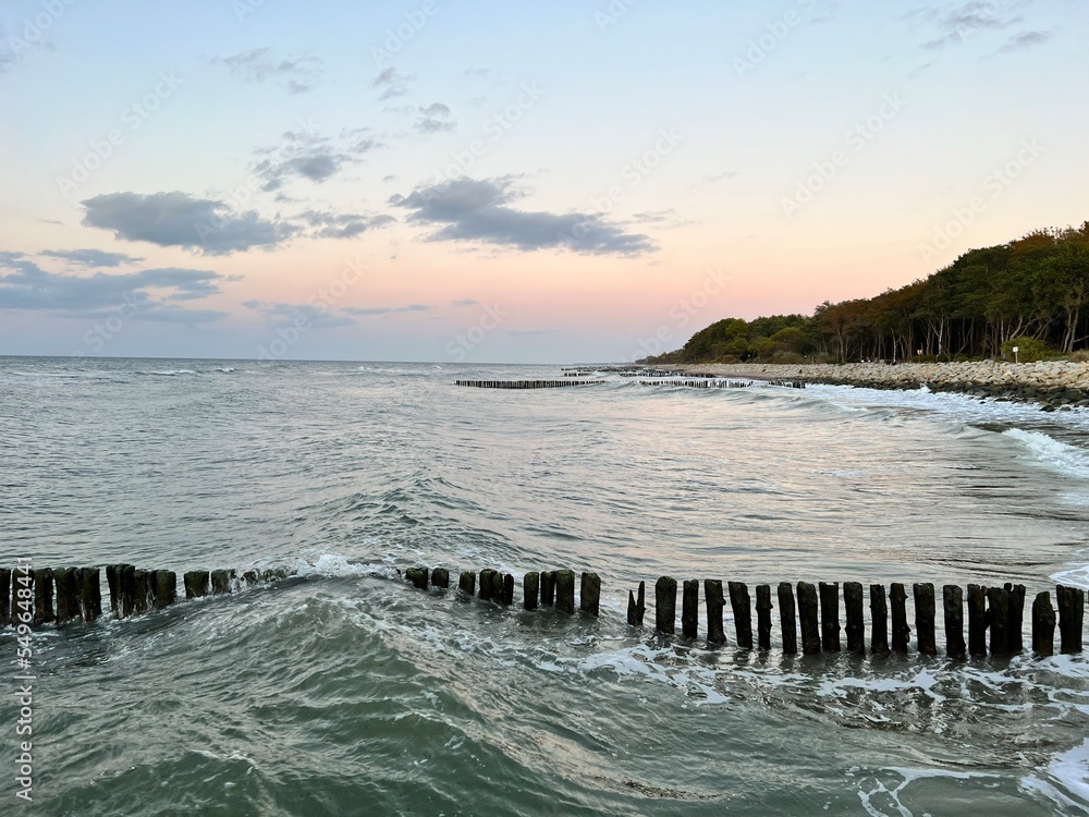 A wooden breakwater on the Baltic Sea protecting the shore from the waves