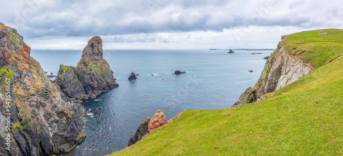 UK, Scotland, Sea stacks seen from Hillswick Ness photo