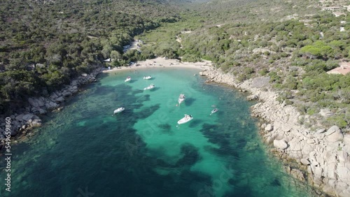 Tizzano Beach Las Cricas cove on French Corsica Island Mediterranean Sea with boats and tourists bathing, Aerial look down approach shot photo