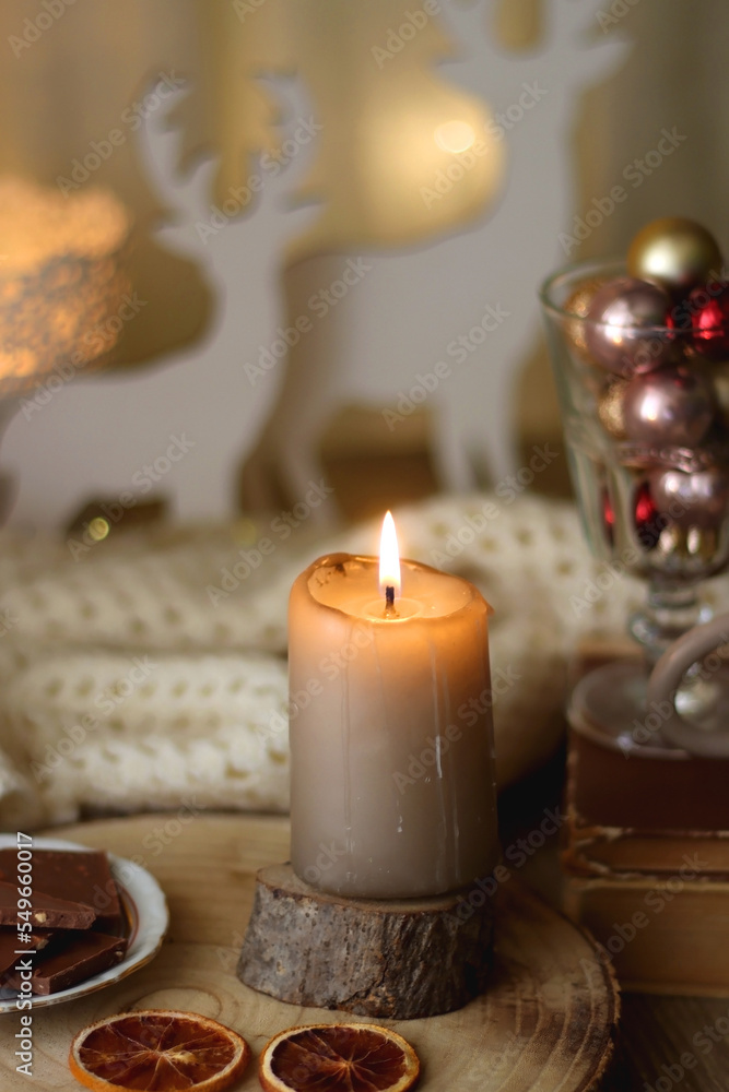 Cup of tea or coffee, various sweets and spices, Christmas decorations, comfy blanket, books and glasses. Selective focus. Cup of tea or coffee, various sweets and spices, Christmas decorations, comfy blanket, books and glasses. Selective focus.