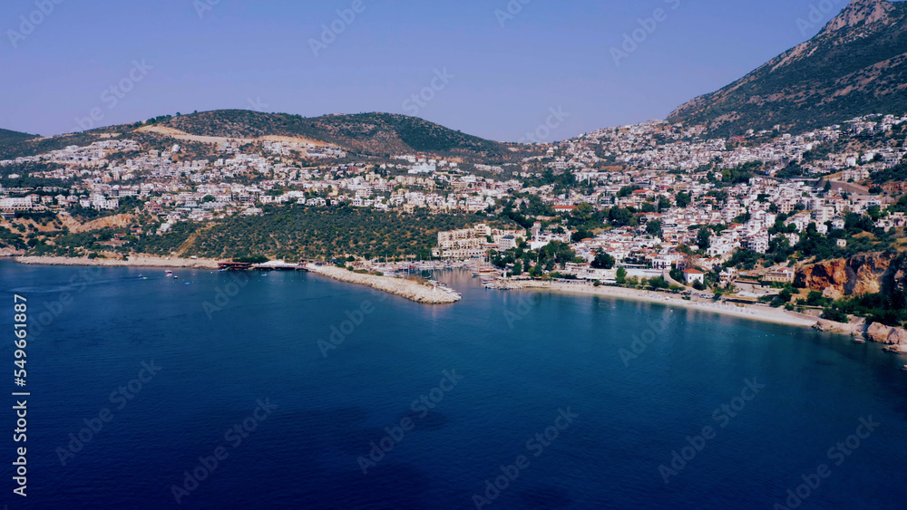 Aerial panoramic view of blue sea, cityscape and mountains. Panorama of coastal town at Turkey.