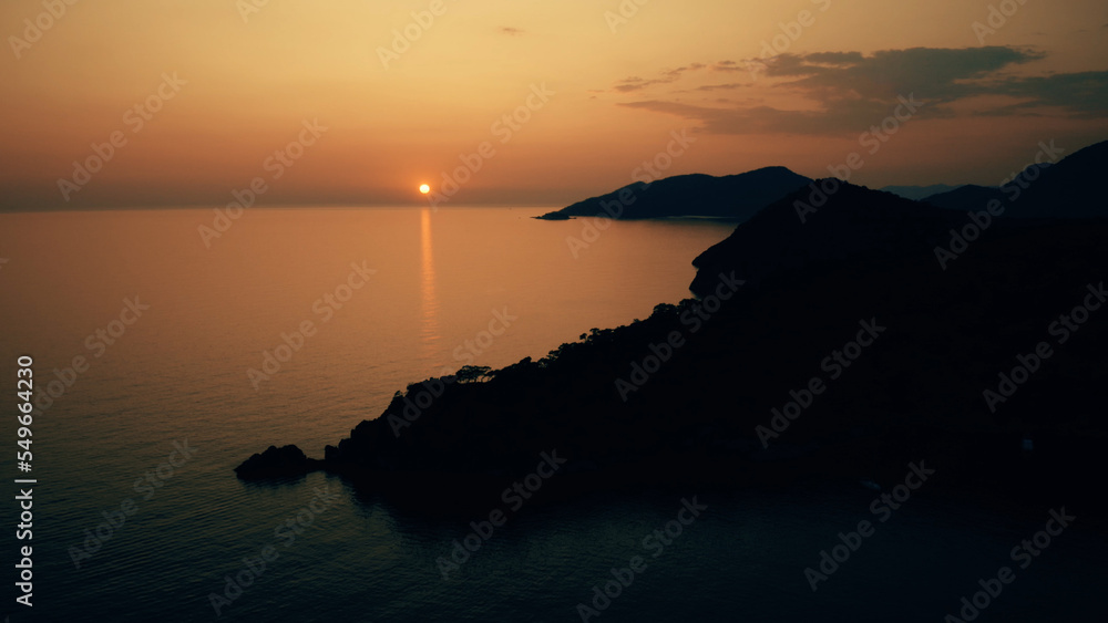 Obraz premium Stunning view of sea bay at sunset time. Beautiful seascape. Nature panorama from above.