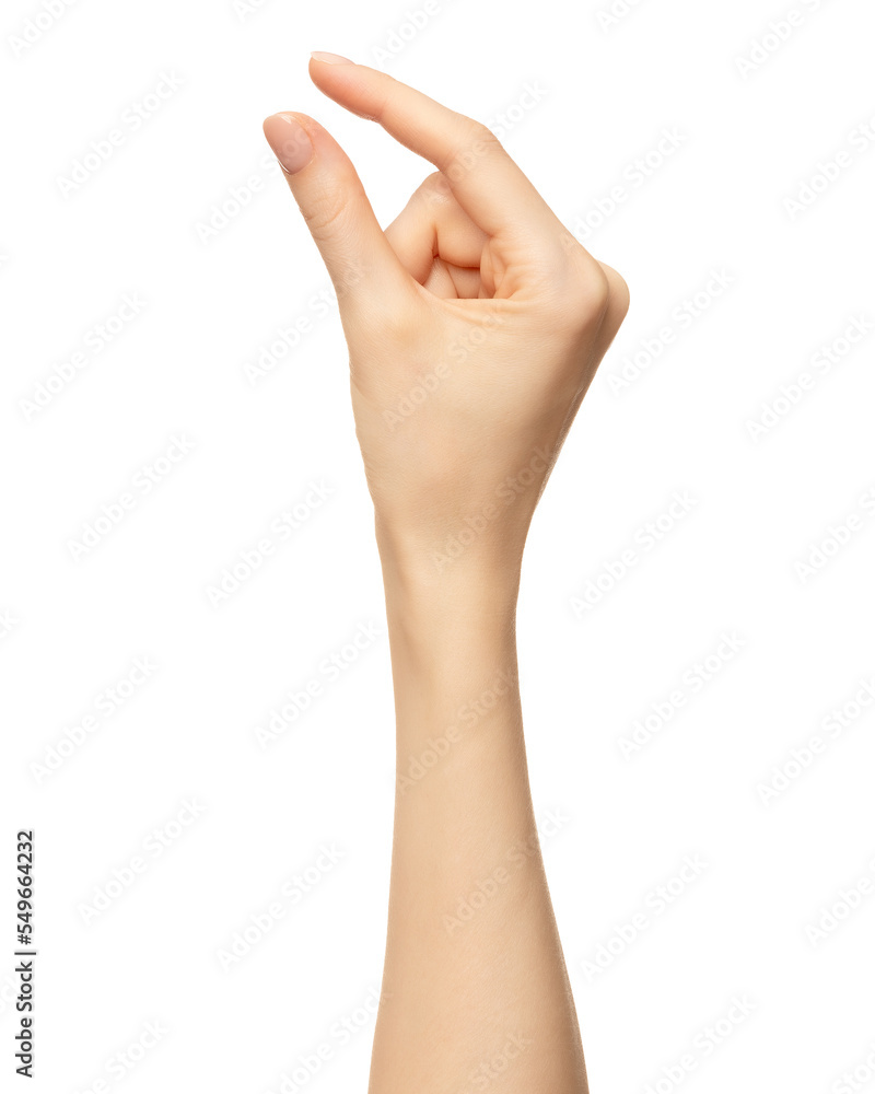 Hand hold little object isolated on white. Female hand fingers pinch or hold invisible item Hand hold little object isolated on white. Female hand fingers pinch or hold invisible item