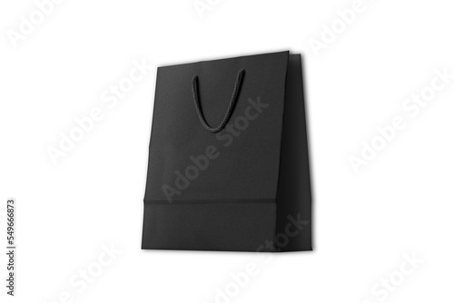 Black shopping bag - isolated retail merchandise package blank mock up, dark matte gift packaging template for store branding and commerce, isolated on white background. 3d rendering.