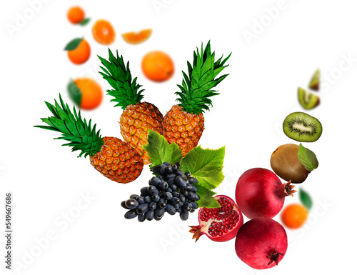 Juicy, tasty, fresh kiwi, grape, pomegranate, orange, pineapple levitate on a white background, healthy diet. Fresh fruits and vegetables