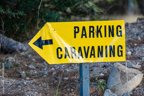 Road sign indicating direction to RV caravan parking