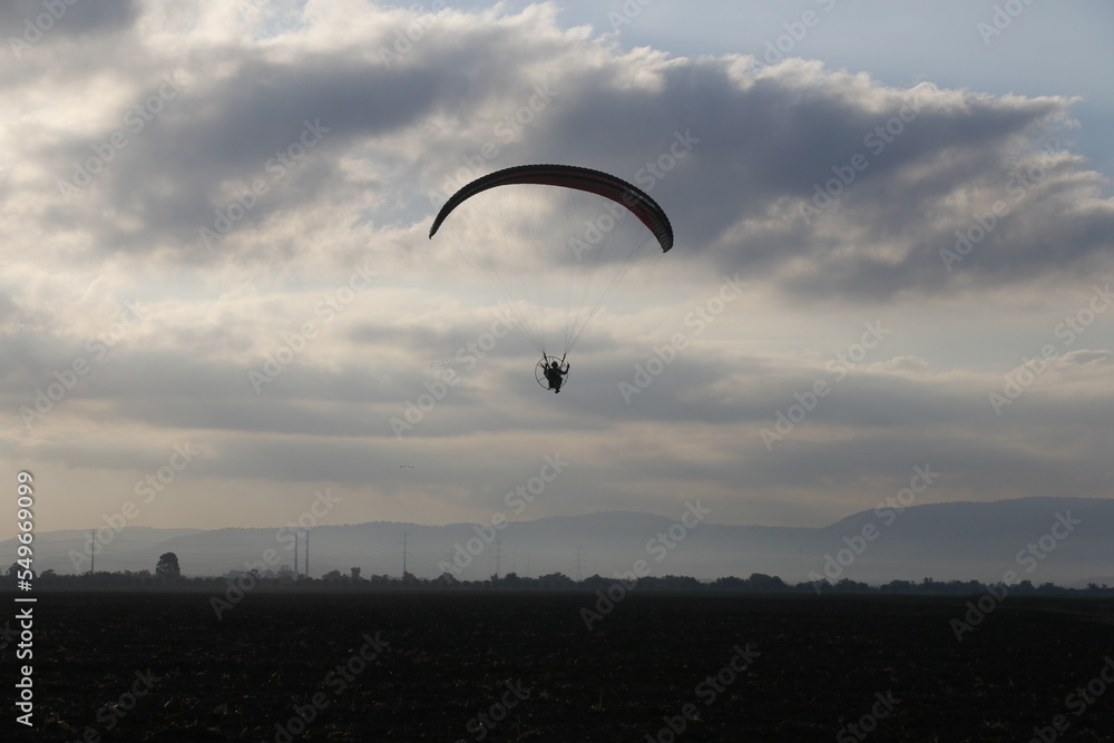 paragliding in the sky