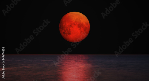 Fotografia Full moon rising over empty ocean at dark night Elements of this image furnishe