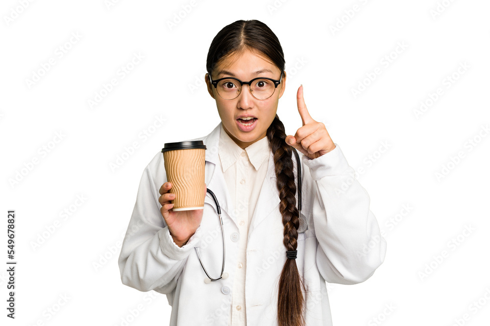 Young doctor asian woman holding a takeaway coffee isolated having an idea, inspiration concept. Young doctor asian woman holding a takeaway coffee isolated having an idea, inspiration concept.